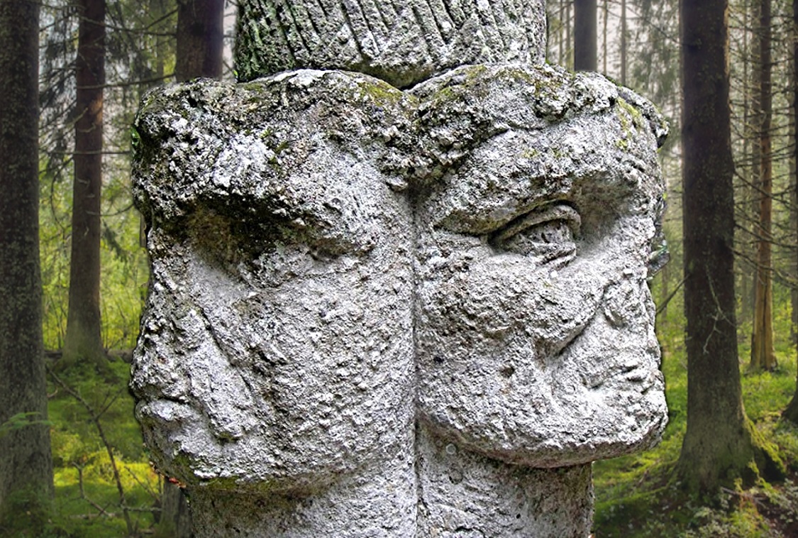 A grim Janus-faced column in the Park of the Monsters