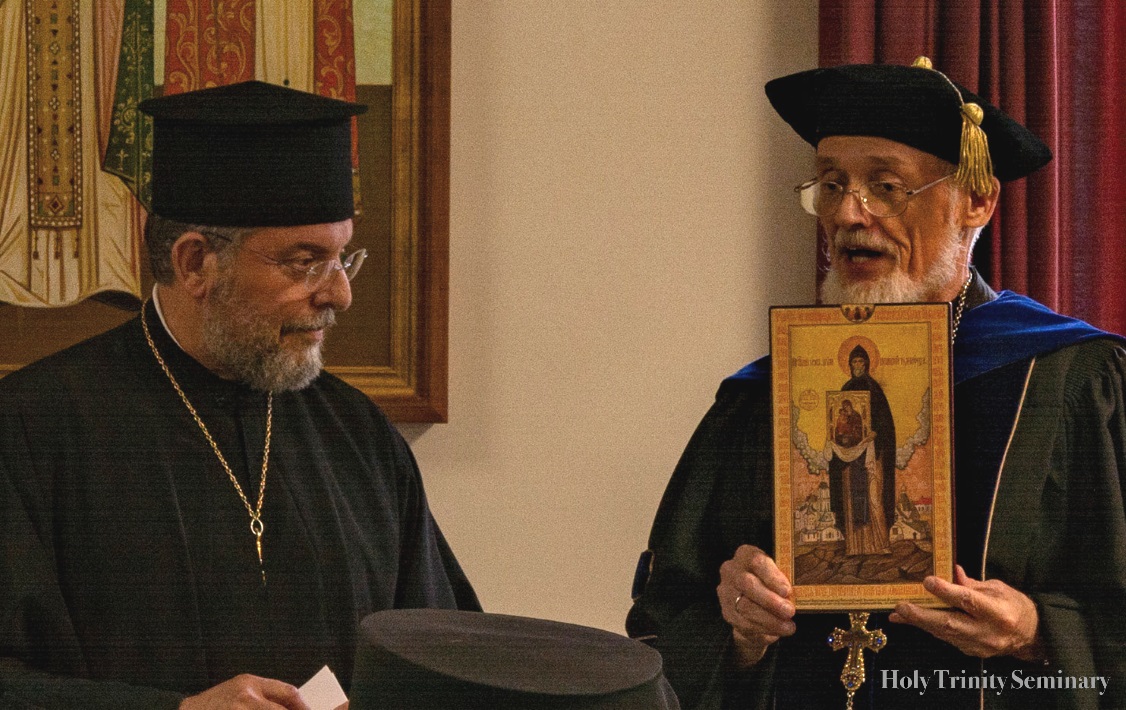 Fr. Alexander F.C. Webster, Dean of Holy Trinity Orthodoxy Seminary, presenting the icon of St. Job of Pochaev to Fr. Patrick Viscuso